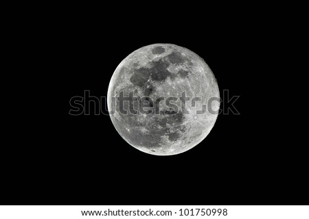 Brilliant full moon on clear black sky