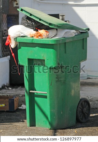 pile of garbage in trash bin or container