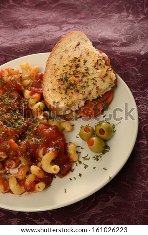 gourmet toasted salami sandwich and pasta