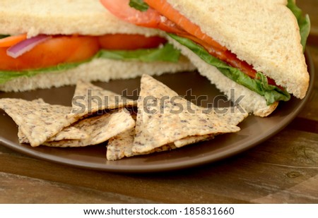 tortilla chips with a vegan sandwich