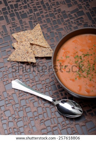 vegan tomato soup and chips in winter