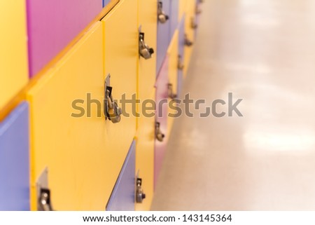 Colorful school lockers in yellow, blue and purple