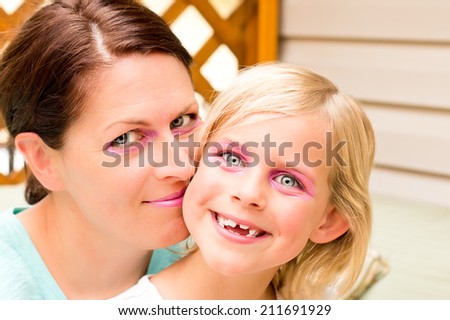 Mother and Daughter Goofing Around for the Camera
