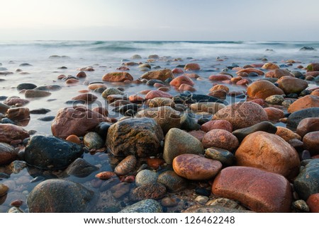 [Obrazek: stock-photo-stony-beach-after-sunset-126462248.jpg]