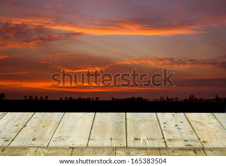 after sunset landscape with wood floor
