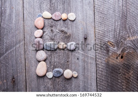 [Obrazek: stock-photo-e-letter-alphabet-stones-lai...744532.jpg]