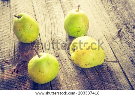 vintage photo of pears on wooden table
