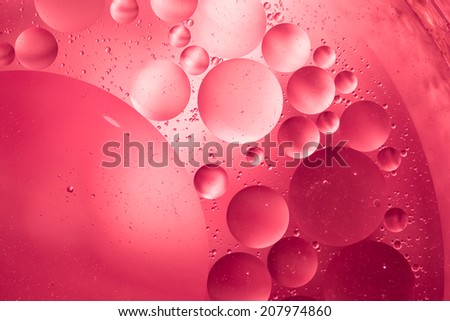 abstract oil droplets on water surface