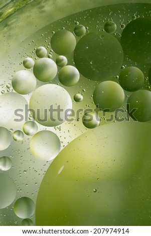 abstract oil droplets on water surface