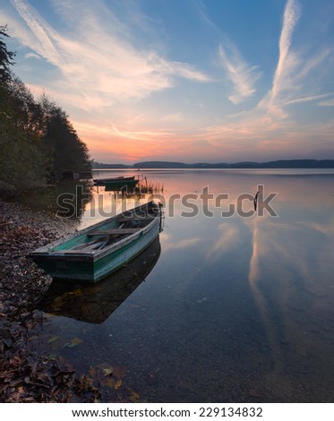 lake landscape with boat on shore