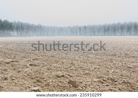 [Obrazek: stock-photo-winter-plowed-field-landscape-235910299.jpg]