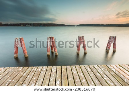 lake landscape with jetty. long time exposure