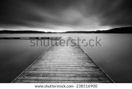 lake landscape with jetty. long time exposure