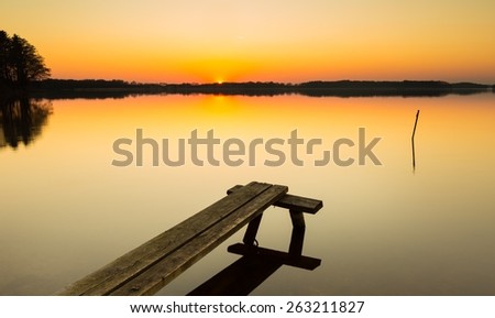 Beautiful lake landscape at sunset. Beautiful polish lake photographed in Mazury lake district.