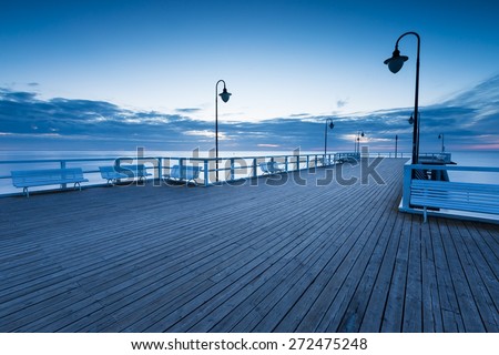 Beautiful morning seascape with wooden pier. Pier in Orlowo, Gdynia in Poland.