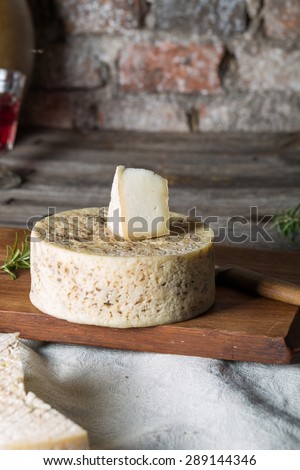 Still life with french goat cheese. Studio shoot with mystic light effect.