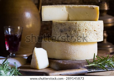 Still life with french goat cheese. Studio shoot with mystic light effect.