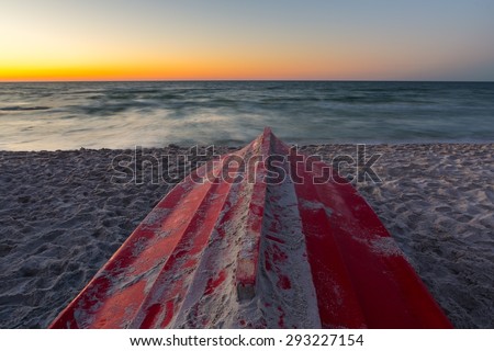 Beautiful after sunset landscape of Baltic Sea shore photographed in Poland. Baltic sea shore with boat.