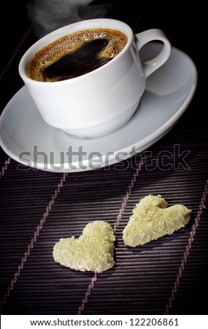 Cup of coffee and biscuit