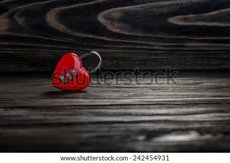 Heart lock on old wood background.Valentines Day background.