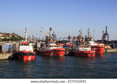 ISTANBUL, TURKEY - August 01, 2012: Four coastguard waiting for any emergency situation at Haydarpasa seaport, Istanbul