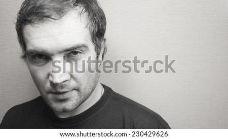 Black and white portrait of young good looking man