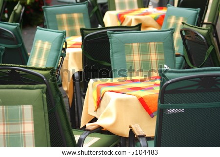 tables in a restaurant with colorful covers