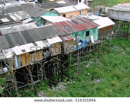 Shanty town in Manaus Amazonia, Brazil - A favela is a specifically portuguese word for a shanty town. The Wooden houses built on high stilts called Palafitas. Photo taken 02/22/2003