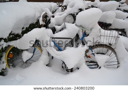 Bikes covered with snow in Munich, Germany in Dezember 2014