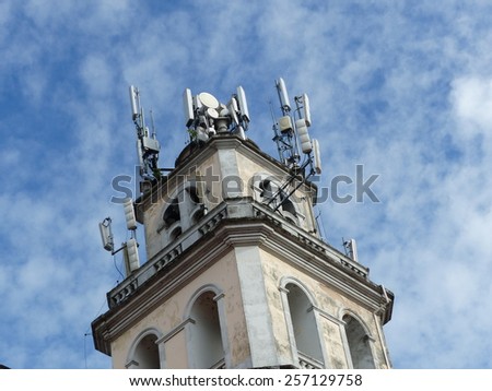 Mobile antennas disfigure steeple, Manaus Amazonas, Brazil