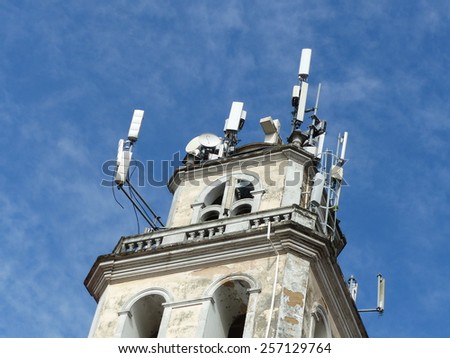 Mobile antennas disfigure steeple, Manaus Amazonas, Brazil
