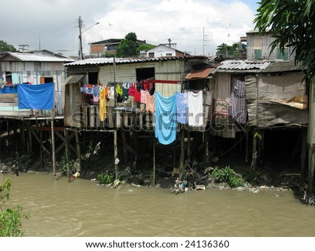 Shanty town in Manaus Amazonia, Brazil.  A favela is a specifically portuguese word for a shanty town. The Wooden houses built on high stilts called palafitas (Photo taken 01/30/2009)