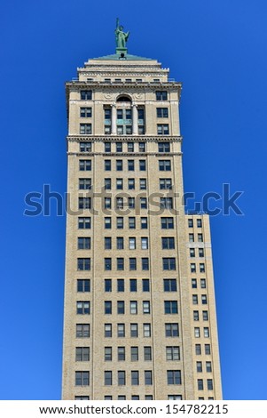 BUFFALO - JUNE 26 :The Liberty building in Buffalo,NY on june 26,2013. Built in 1925, the 23 story office tower is a rare example of Neoclassical architecture.