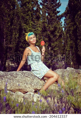 creative girl with a bright lollipop
