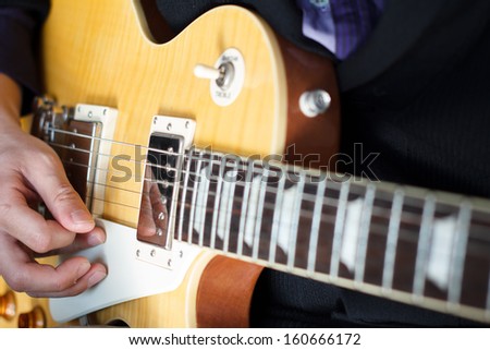 my friend is playing guitar