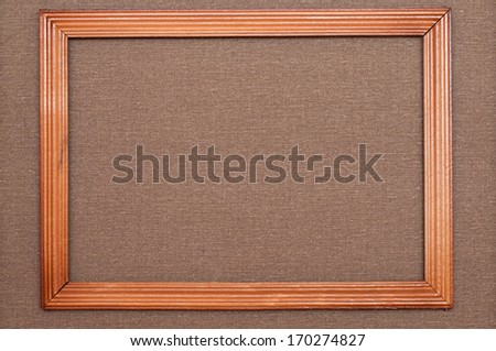 Old wooden frame with cotton canvas