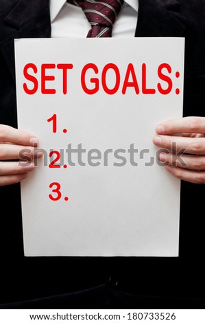 Set Goals. Businessman listing his goals