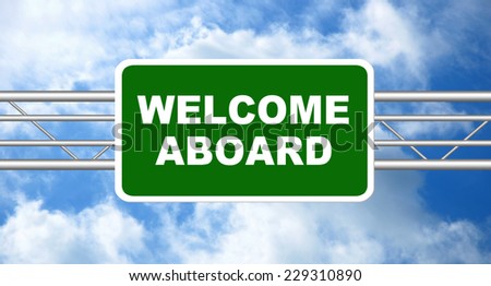 Welcome Aboard written on a green road sign with a blue sky in a background