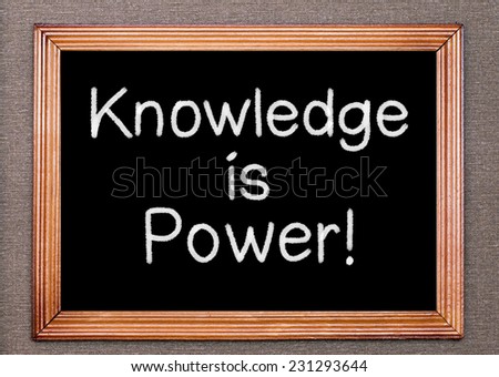 Knowledge is power written on a chalkboard