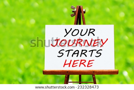 Your Journey Starts Here written on easel