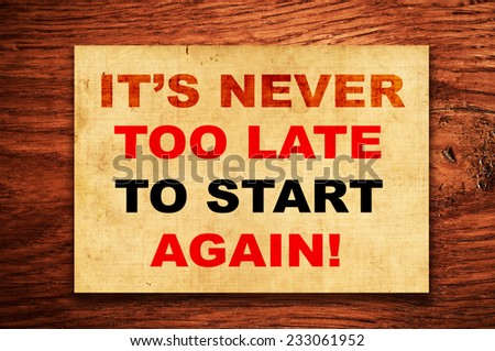 It\'s never too late to start again! written on a grunge paper