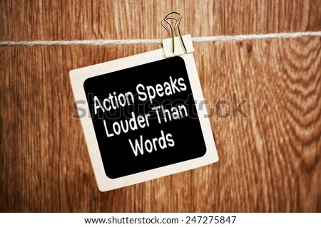 Action Speaks Louder Than Words written on a chalkboard
