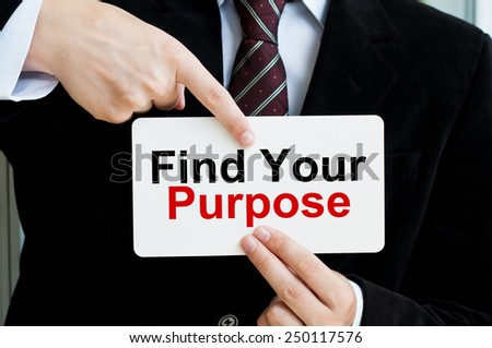 Find Your Purpose. Businessman shows a message text
