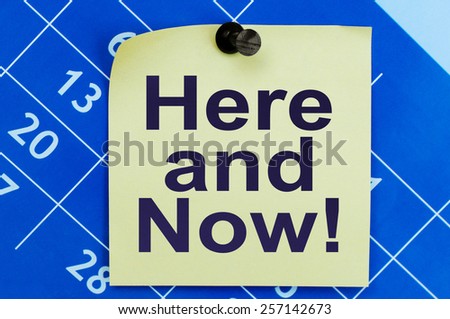 Here And Now written on a sticker