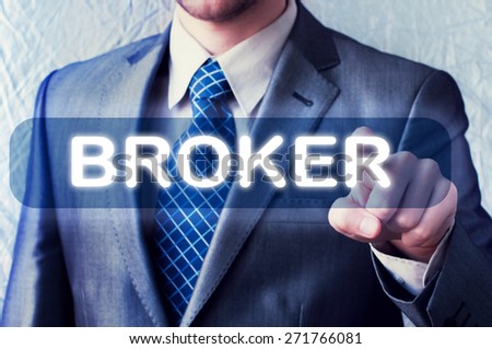 Online trading concept. Businessman pressing a Broker button on virtual screen