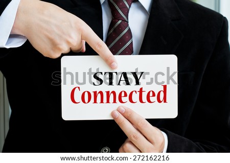Stay Connected written on a card in male hands