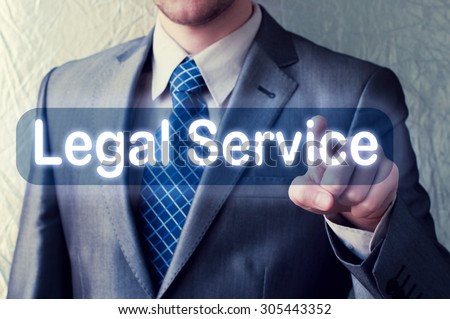 Businessman touching Legal Service button on virtual screen