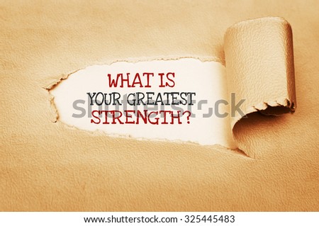 What is Your Greatest Strength? text written behind a torn paper