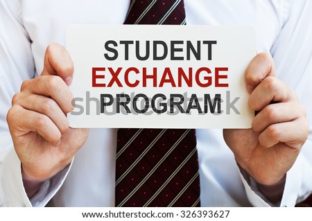 Student Exchange Program card in male hands