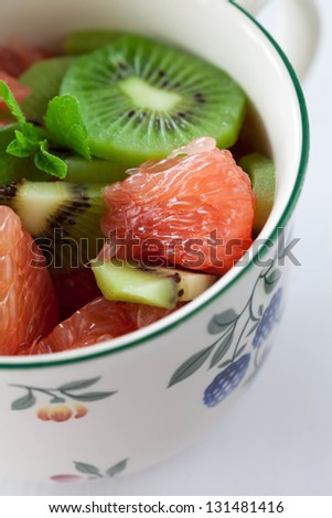 Grapefruit snd kiwi salad in a mug